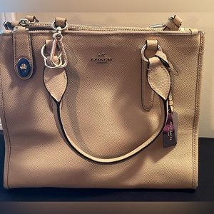Coach, soft Soffiano leather bag w/Crossbody strap as well. Excellent condition